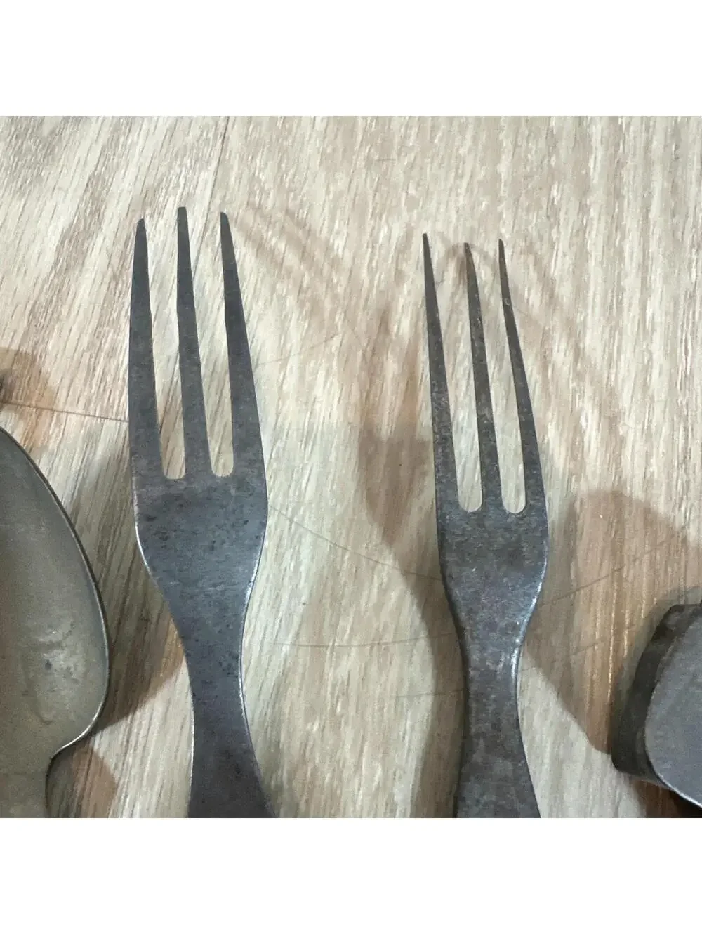 (7) Antique items: 2 graters, 2 forks, 1 spoon,‎ cookie cutter, thimble.